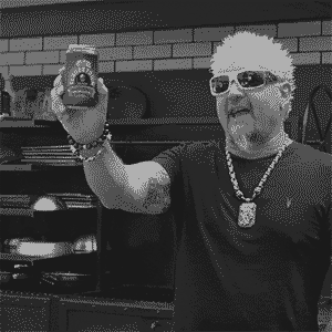 Guy Fieri pointing to can